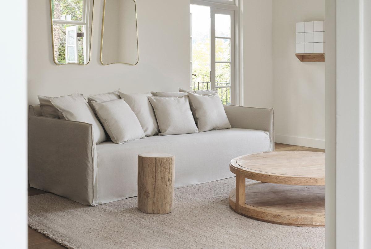 A round coffee table made of old elm timber