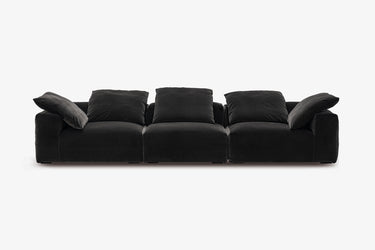 Black velvet sofa, long three-piece configuration, studio front view