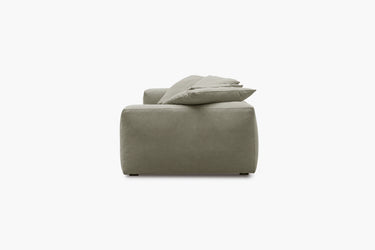 Sage green sofa module, side profile view