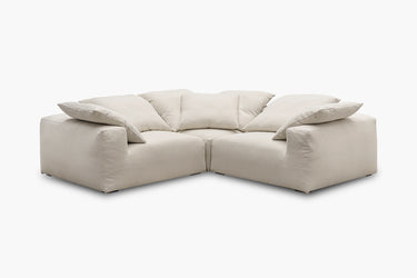 Cream corner nook sofa with three modules, studio front view