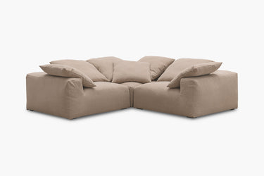 Warm taupe corner nook sofa with three modules, studio front view