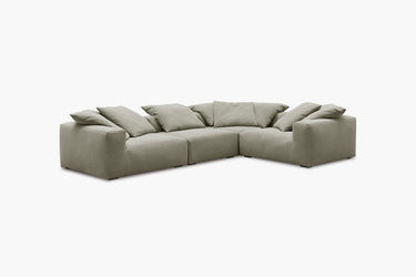 Sage green corner sectional sofa, four-piece configuration, angled view