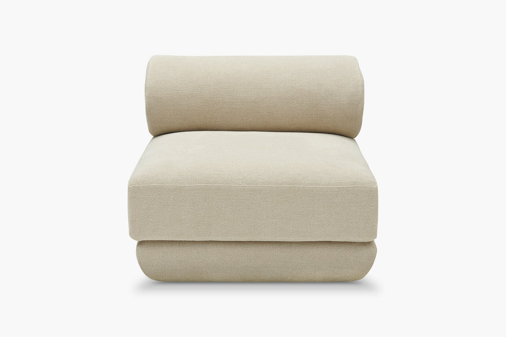 cream armless armchair