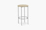 Bar stool with an Olive Vinyl seat and metal legs on a white background