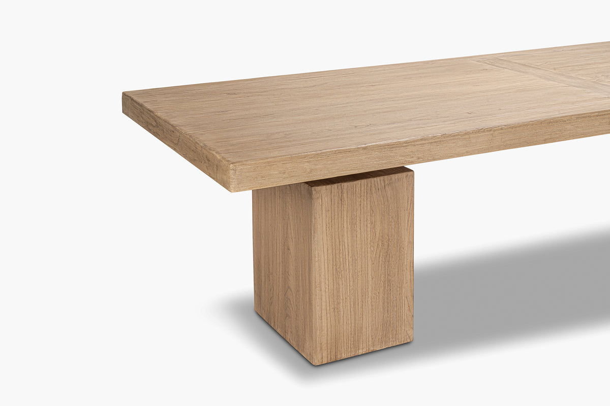 Wooden dining table on a white background