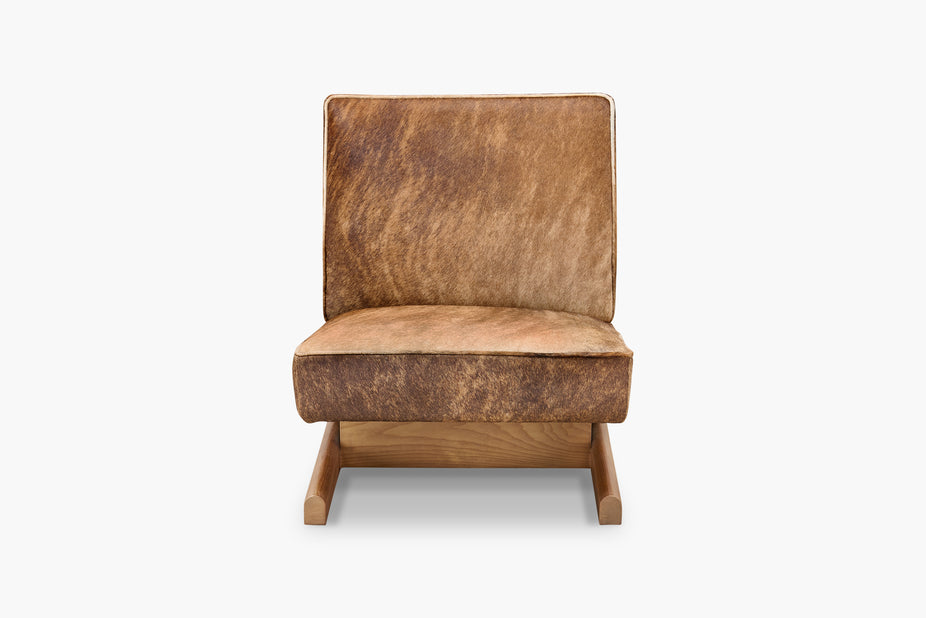 Brown leather armchair on a white background