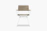 Tan rope outdoor dining armchair, front studio view