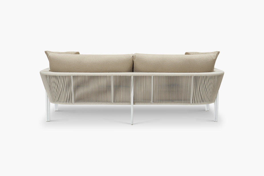 Beige boucle outdoor sofa with white rope frame, rear view